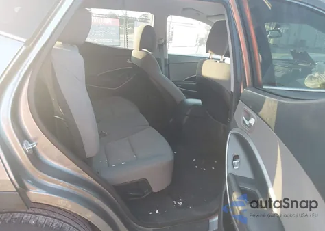 2015 Hyundai Santa Fe Sport 2.4L z USA, uszkodzony, nr VIN 5XYZTDLB4FG266918